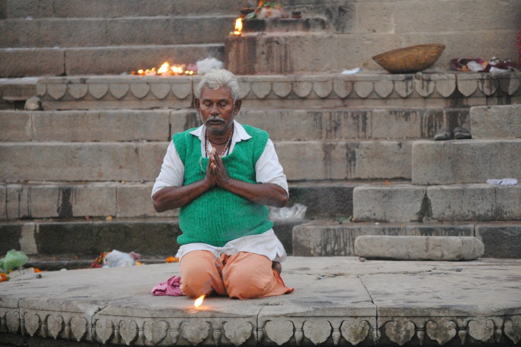 Praying before sending the diya into the water.