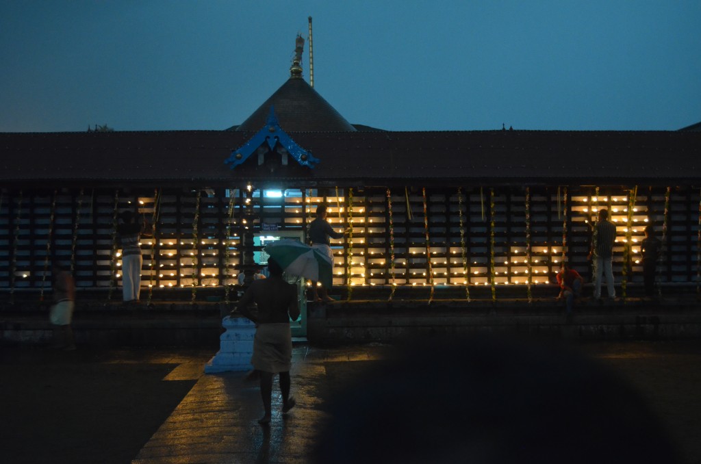 People were lighting candles surrounding the main part of the temple. This picture was shot as we were just entering the front gate attempting to find shelter from the rain.