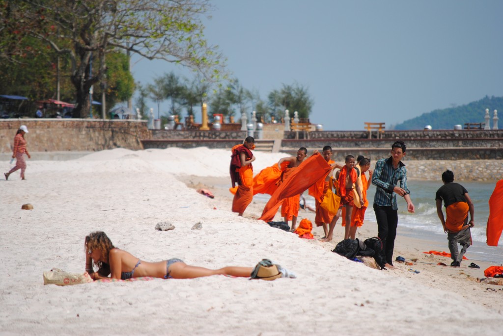 There were a bunch of monks at the beach, something I've never seen before, and the contrast with the woman in a bikini a few feet away from them was too funny to pass up taking a picture of.